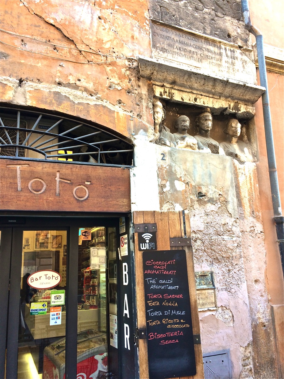 Look at those Roman heads in the wall!